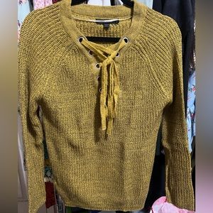 knit yellow sweater